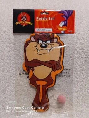 Vintage Looney tunes taz shaped paddle ball game